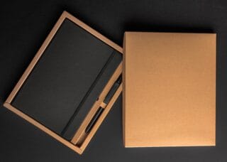 Cost-effective pencil and notebook storage box showing strong stiffness of greyboard.
