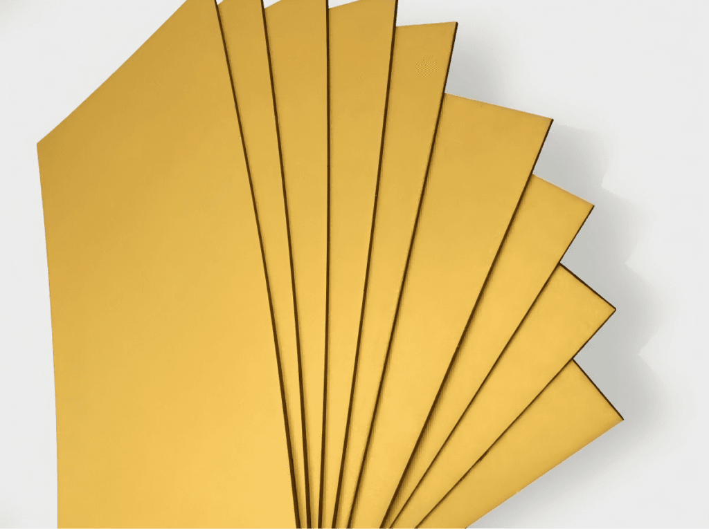 Dyed paper sheet front surface showing smooth color finish and natural fiber texture for packaging applications