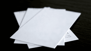 SBS Paperboard clothing hang tags production using high-quality ivory board for garment labeling and retail branding applications