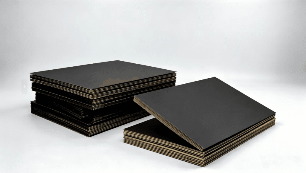 Black Paper Laminated Greyboard with black surface paper and greyboard core for rigid packaging.png