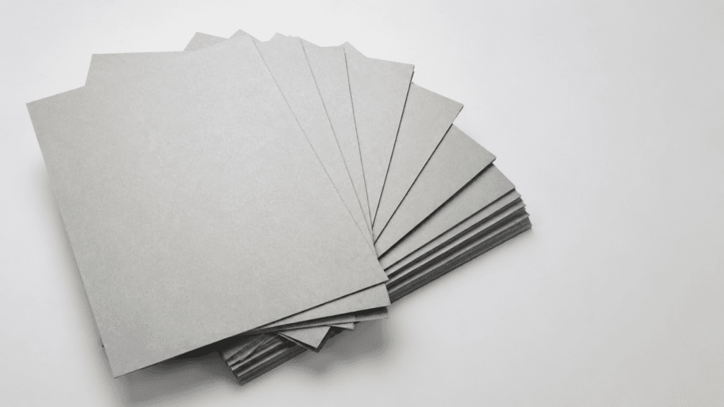 Grey board sheets for rigid packaging and bookbinding applications
