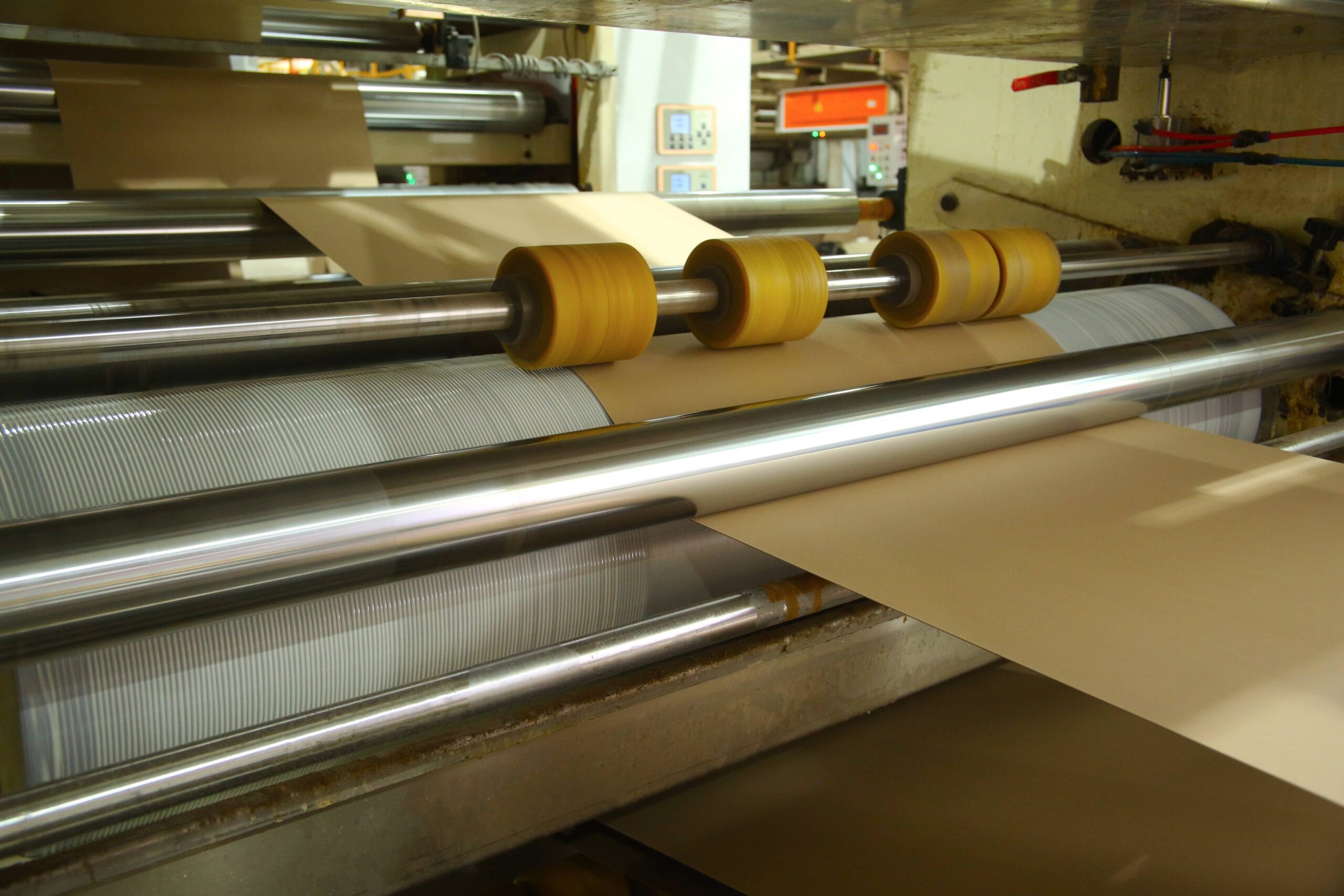 Precision eco-friendly adhesive application for strong bonding in sustainable greyboard manufacturing process