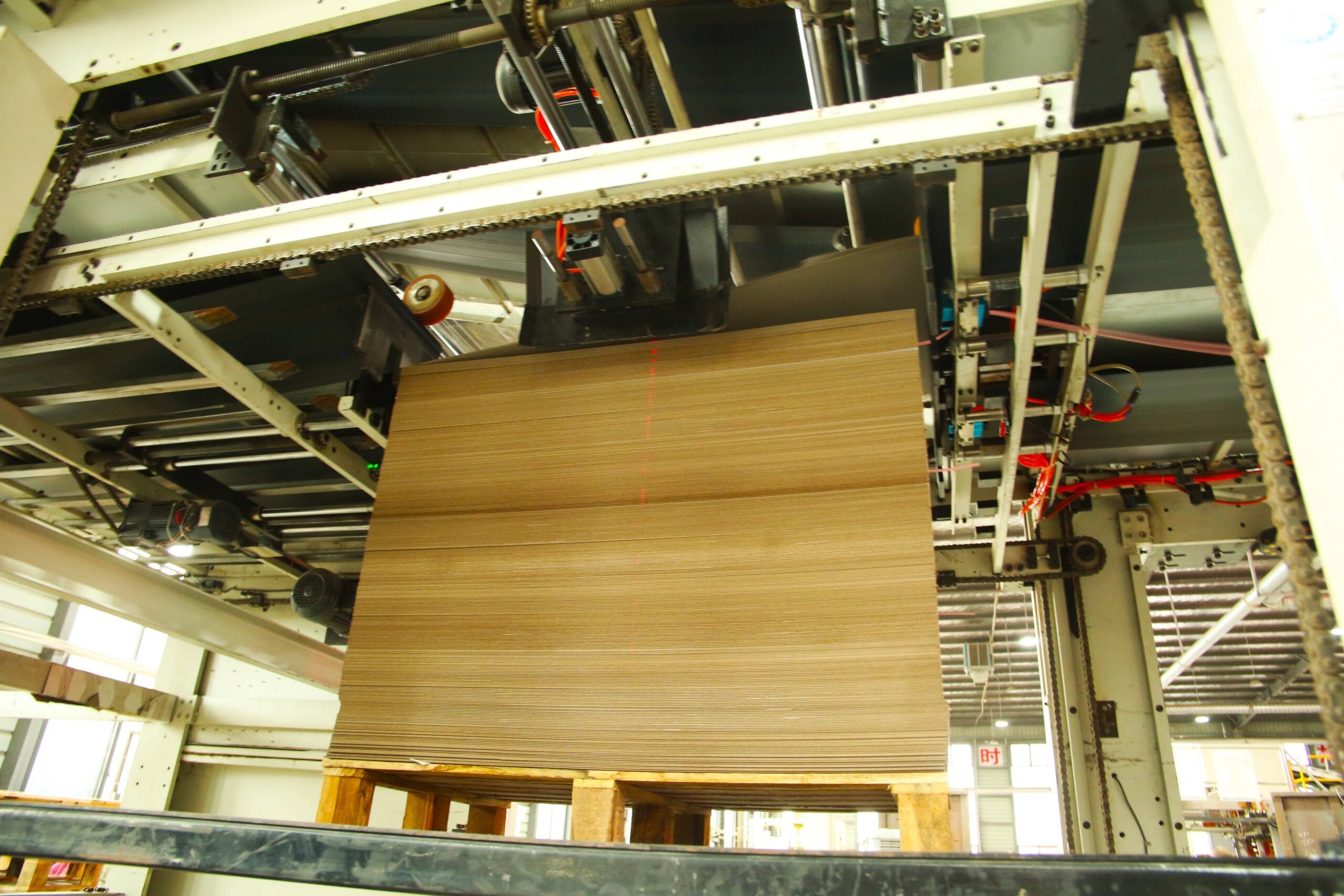 Organized stacking of finished greyboard sheets for efficient warehouse handling and logistics