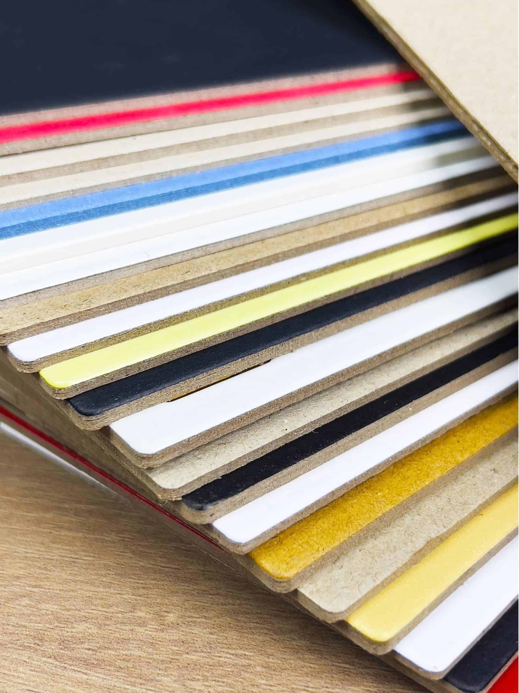 2025 11 26 14 38 IMG 8144 red Cedar paperboard featuring natural yellow fiber color.