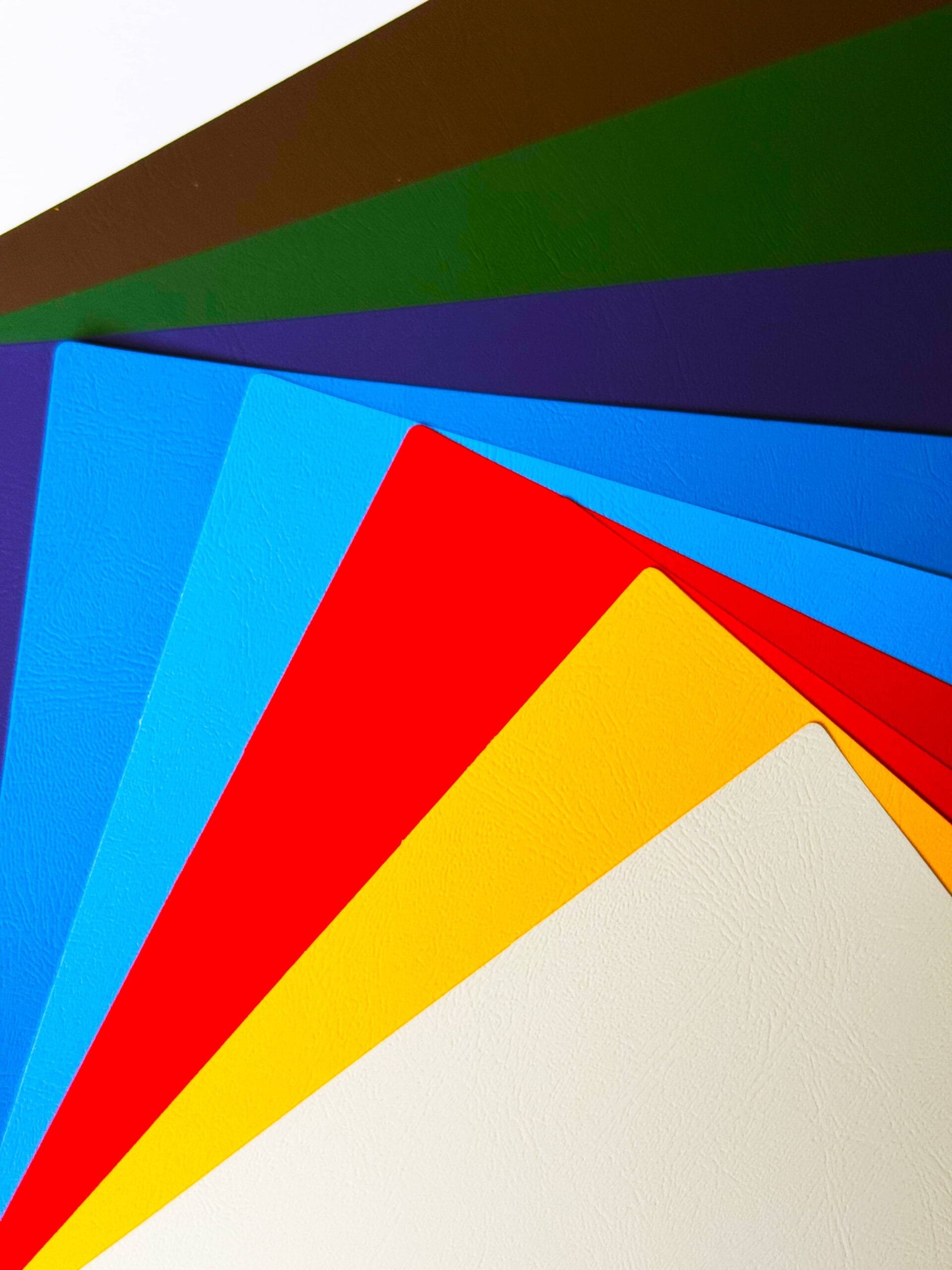 2025 11 26 16 50 IMG 8231 High-gloss specialty paper sheet with smooth reflective finish.