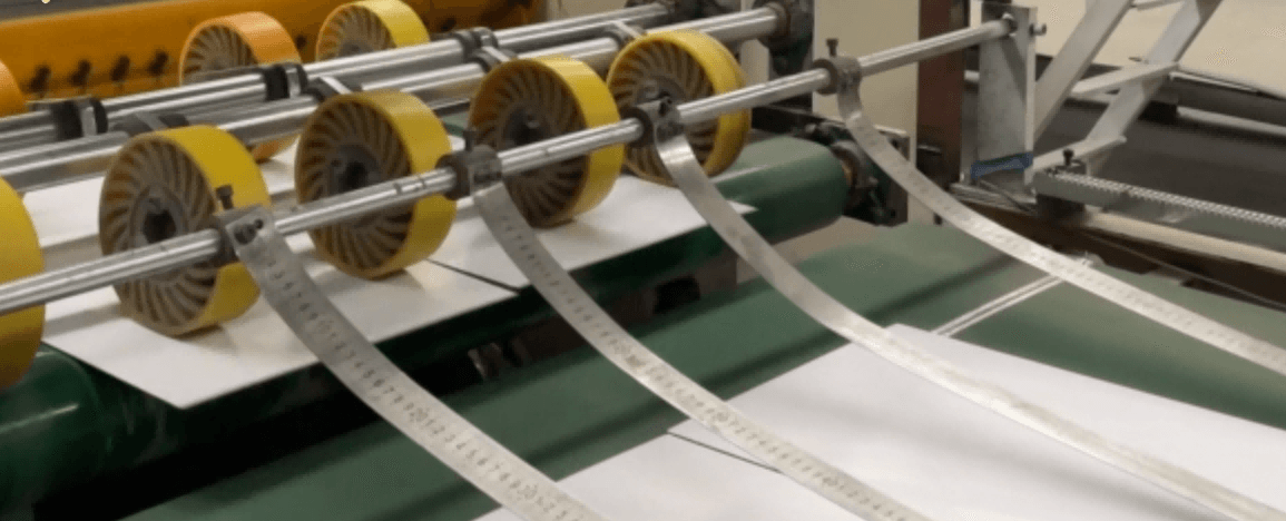 Greyboard production line showing industrial manufacturing process of recycled paperboard used for luxury rigid gift box packaging.