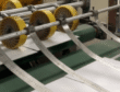 Greyboard production line showing industrial manufacturing process of recycled paperboard used for luxury rigid gift box packaging.