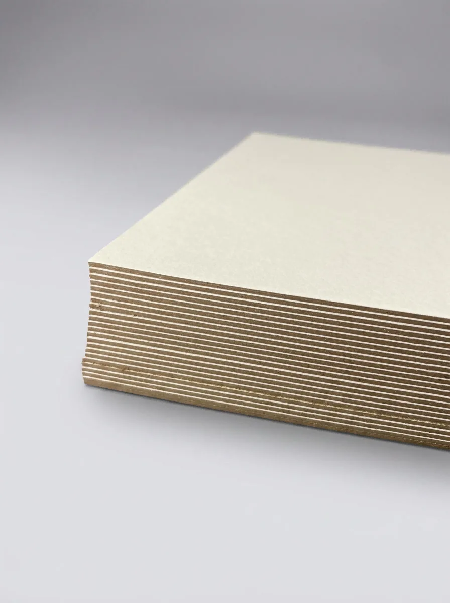 Two-side offset paper laminated greyboard C2S with white surfaces and grey core