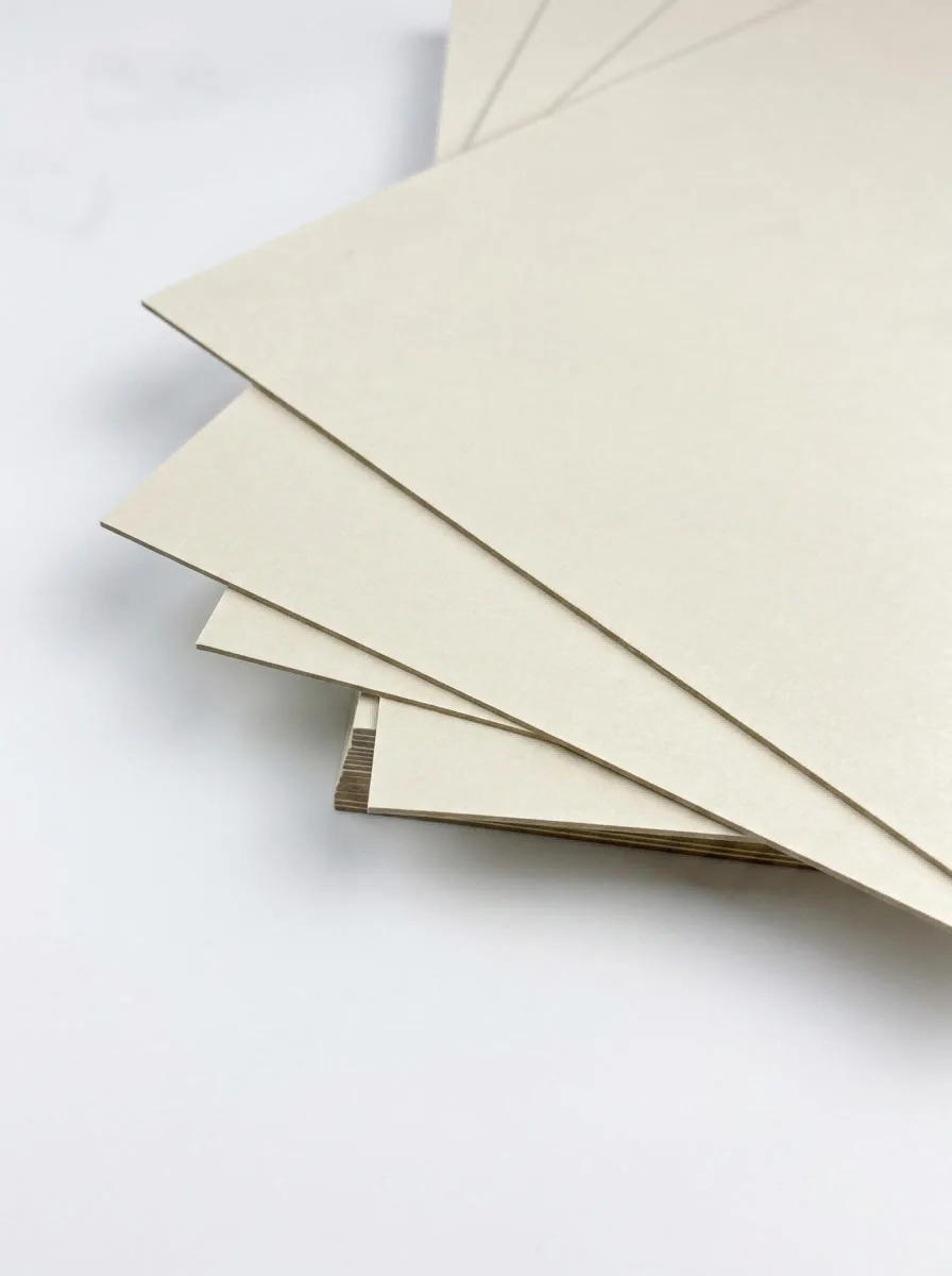 Rigid laminated offset paperboard C2S used for premium rigid gift boxes and book covers