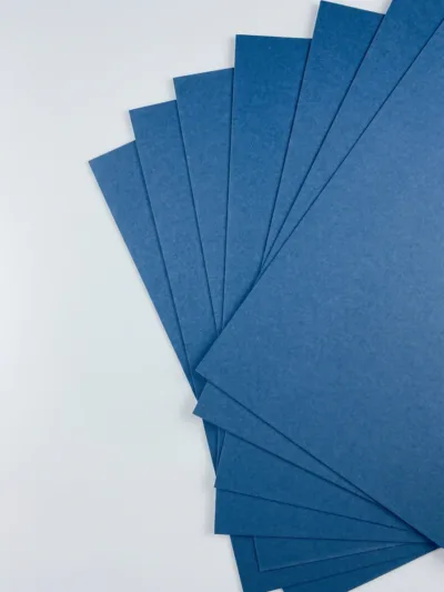 High stiffness blue core board for precision puzzle cutting