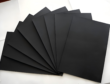Black Paperboard sheet unrolled for packaging and printing applications