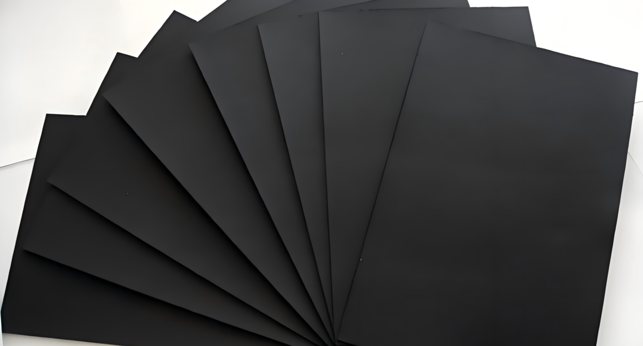 Black Paperboard sheet unrolled for packaging and printing applications