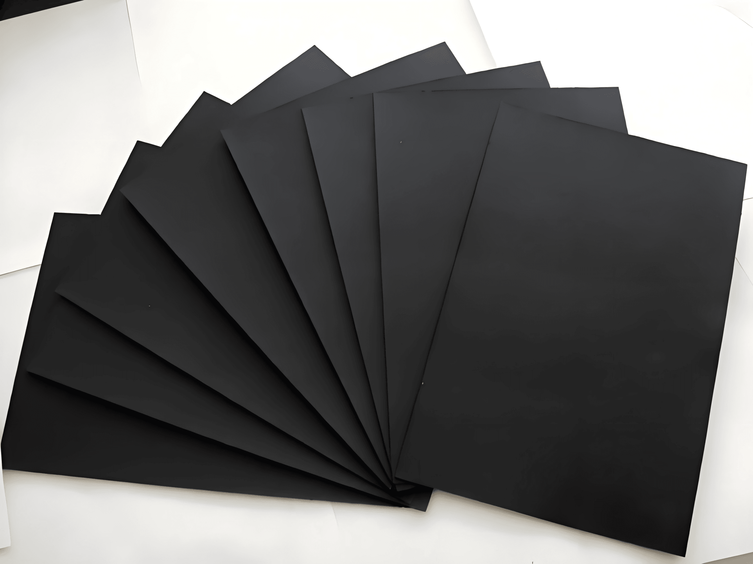 Black Paperboard sheet unrolled for packaging and printing applications