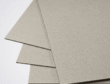 Premium high gloss laminated paperboard sheets arranged for luxury box packaging application.