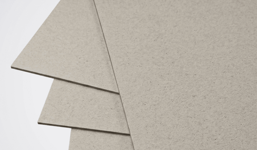 Premium high gloss laminated paperboard sheets arranged for luxury box packaging application.