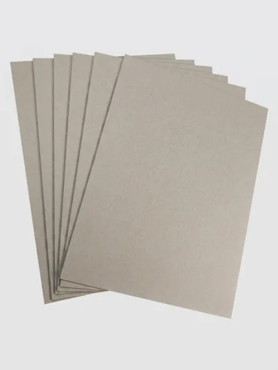 Close-up shot of High Gloss Laminated Paperboard showing its reflective surface mirror effect.