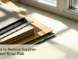 Paperboard supplier trial-and-error risk reduction guide, blog cover image with stacked greyboard, black laminated board and composite board samples.